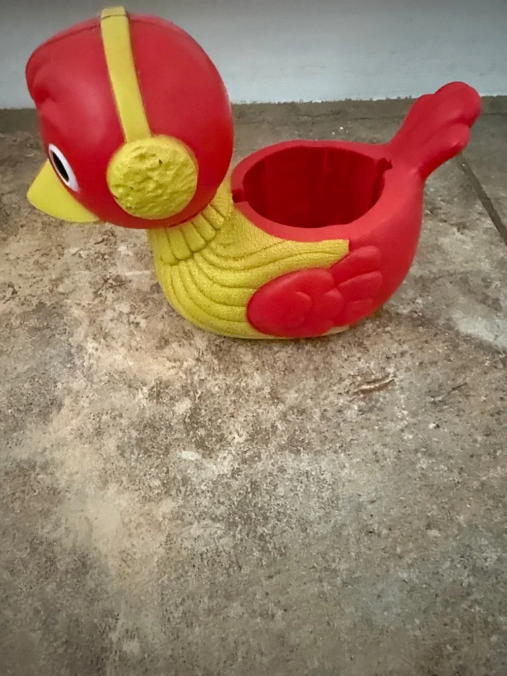 Red and Yellow 1974 vintage Kenner “Ice Bird” shaver for snow cones